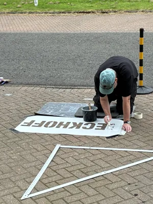 Stencils - Painting company name on car park spaces