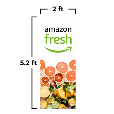 61 x 158 cm Logo of 'Amazon Fresh' above a variety of citrus fruits—sliced oranges, grapefruits, and lemons—against a white background.