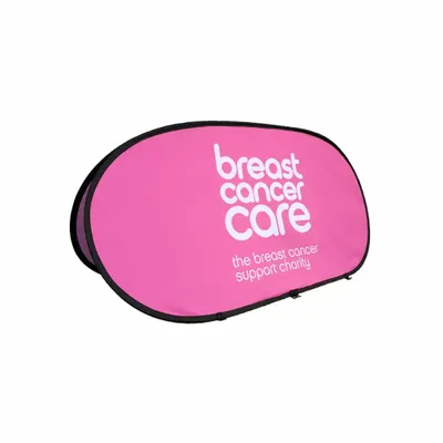 150 x 70 cm A pop-up banner with text 'breast cancer care - the breast cancer support charity' on a pink background, for promotional or informational display.